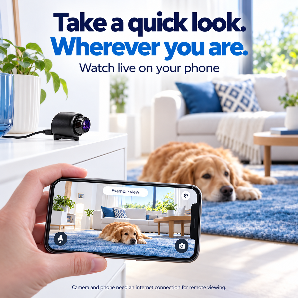 Black camera on a white shelf, cabled, while a hand holds a phone showing a dog 2