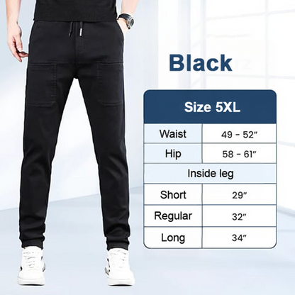 Model wearing the black trousers beside a size chart table listing waist, hip and inside leg measurements 26