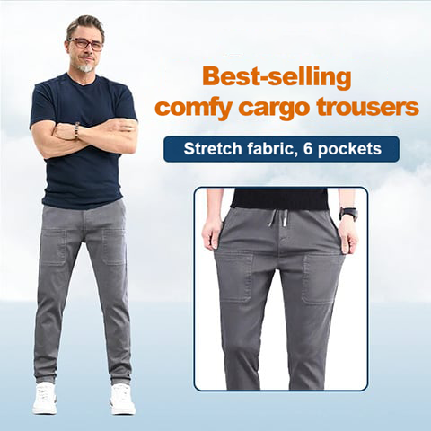 Smiling older man in grey trousers with a close-up of the front pockets and drawstring waist 11