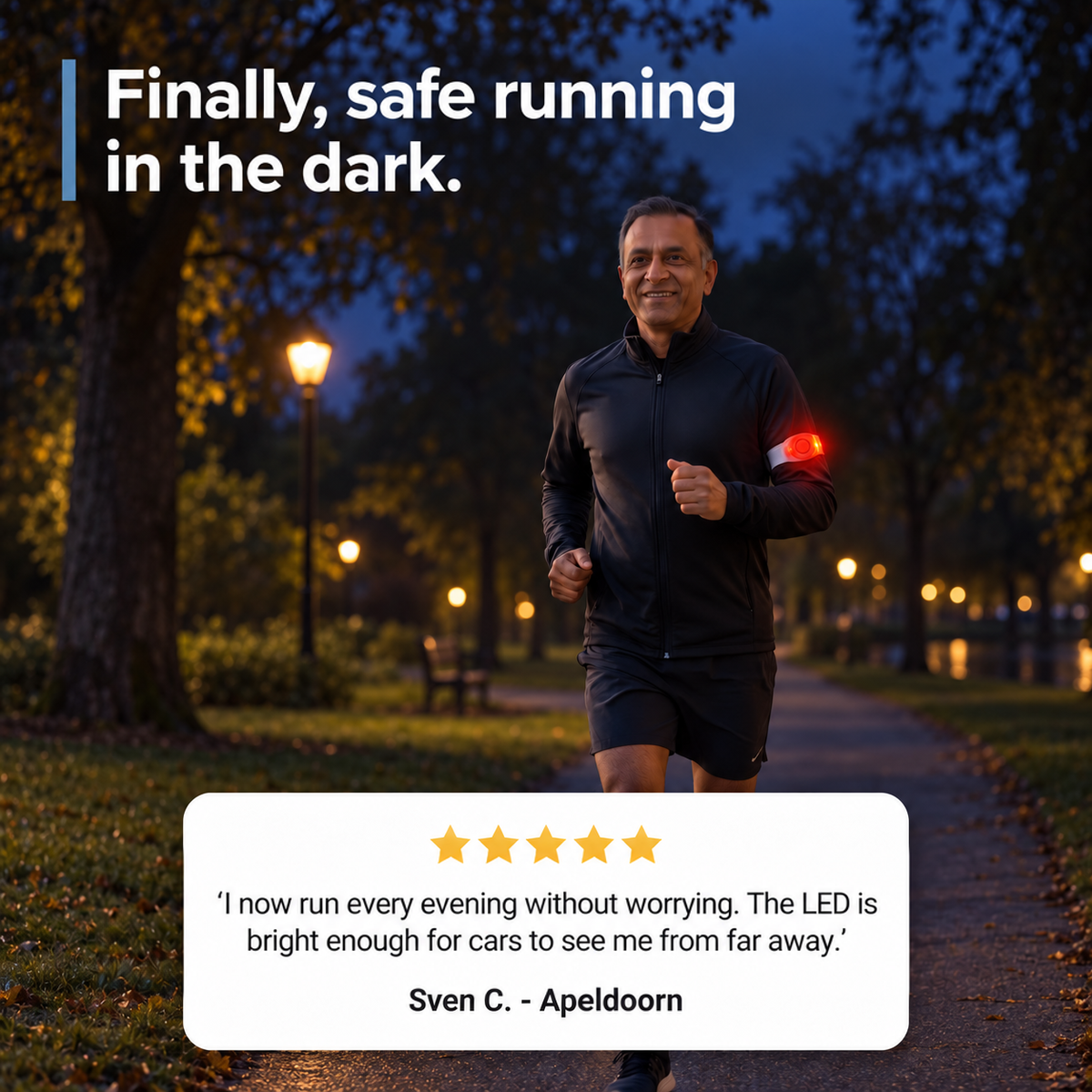 Smiling man jogging through a lamplit park at night with the armband glowing red, with a customer review 8