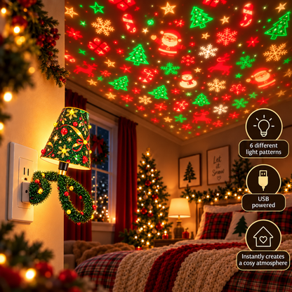Lamp plugged into a bedroom wall socket, casting colourful Santa, tree and snowflake shapes across the ceiling above a bed. 6