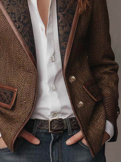 Torso detail showing two metal buttons, patterned lapels and a belt over jeans 8