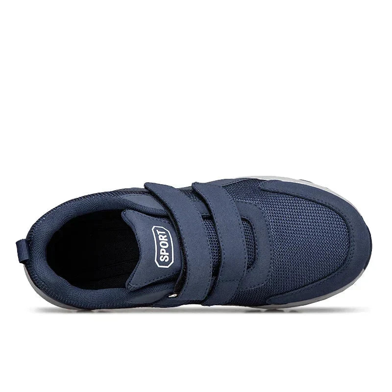 Navy shoe seen from above, showing the two straps, padded collar and opening 14