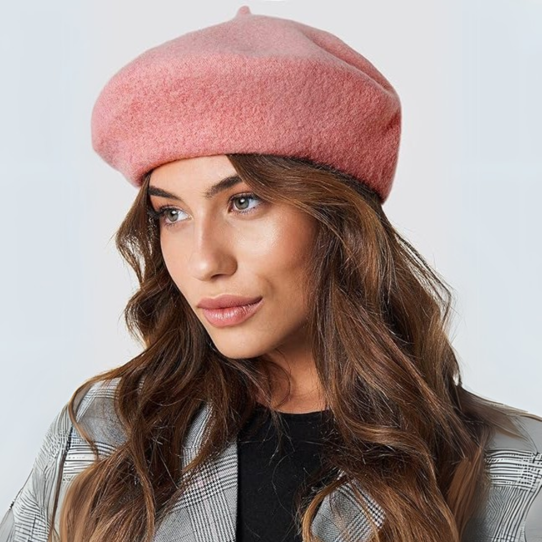 Woman in a pink wool beret, a grey check jacket and a black top, looking to one side 14