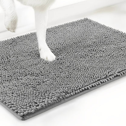 Light grey chenille mat with a white dog's paw stepping onto it, shown at an angle against a white background. 12