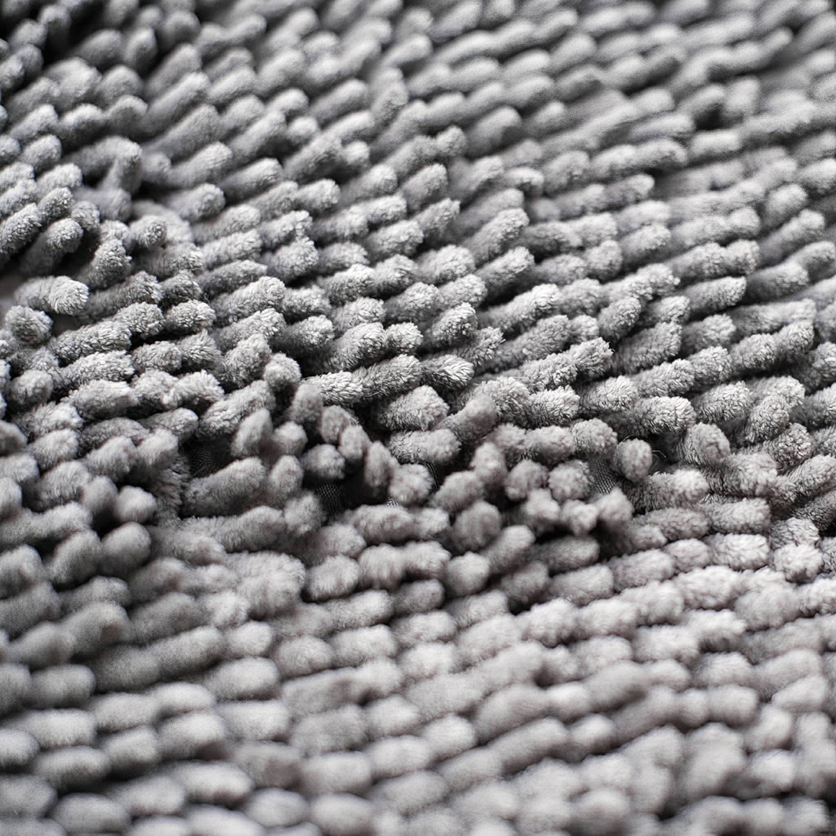 Extreme close-up of the soft grey chenille pile, showing the dense, fluffy, finger-like tufts. 7