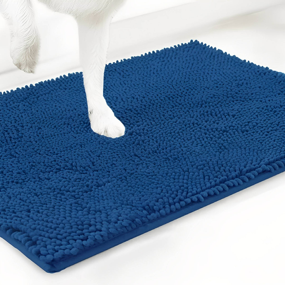 Bright royal blue chenille mat shown at an angle with a white dog's paw stepping onto the pile, on a white background. 17