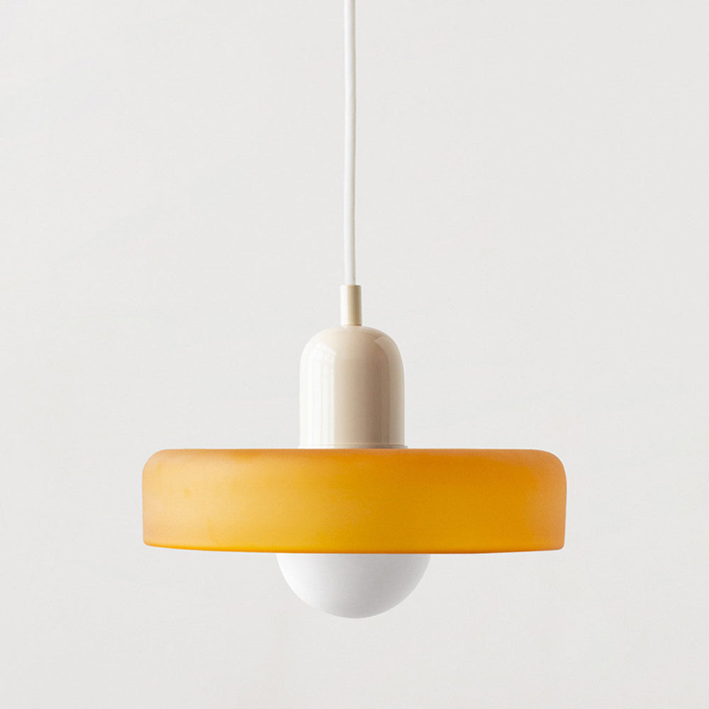 Amber glass shade with a cream cap and white cord, shown against a plain light background 29