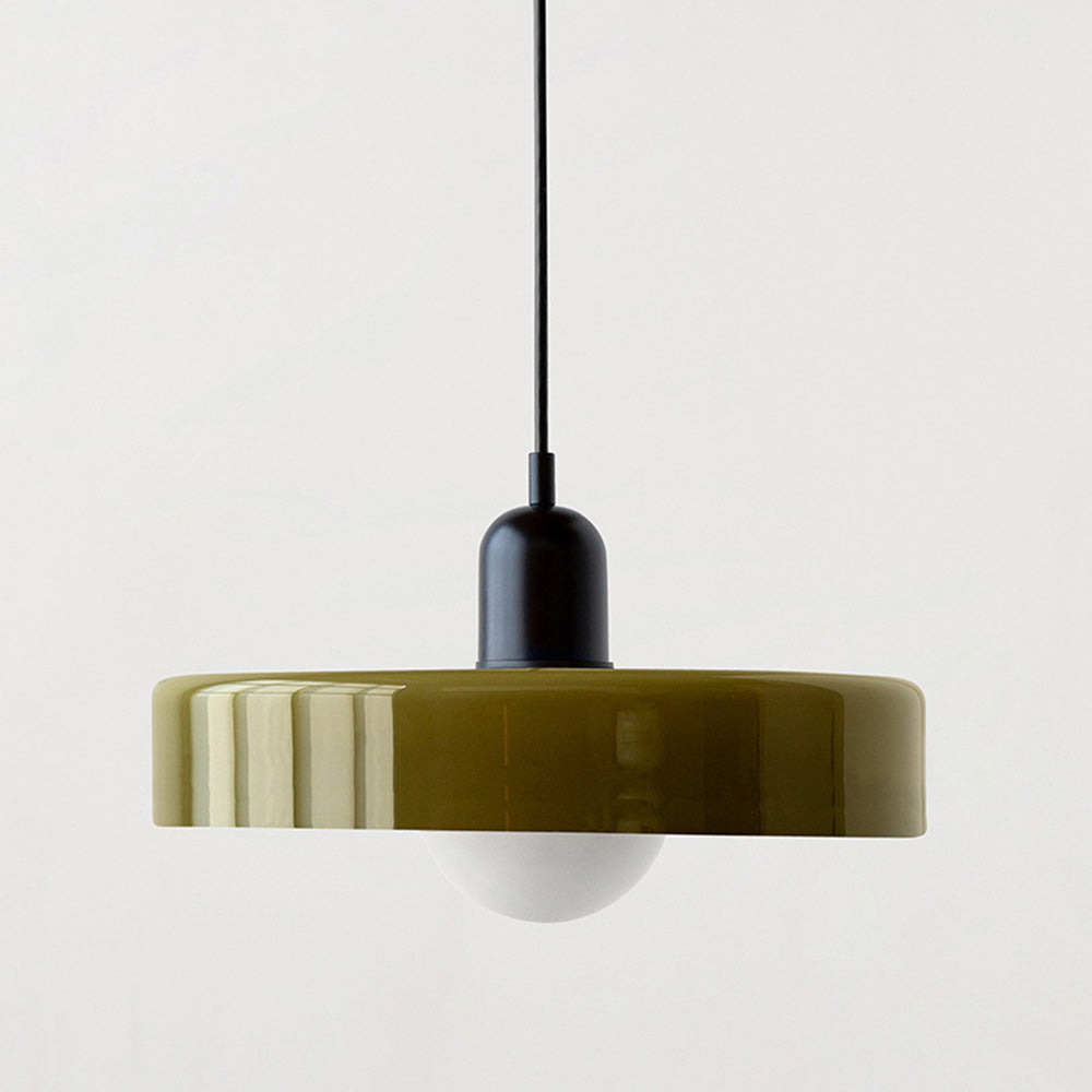 Large olive glass disc pendant with black cap and black cord on a plain background 11