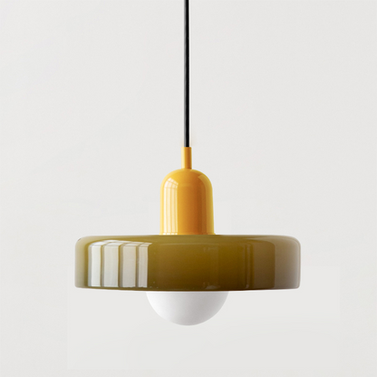 Olive glass disc pendant with a bright yellow cap and opal bulb on a plain light background 19
