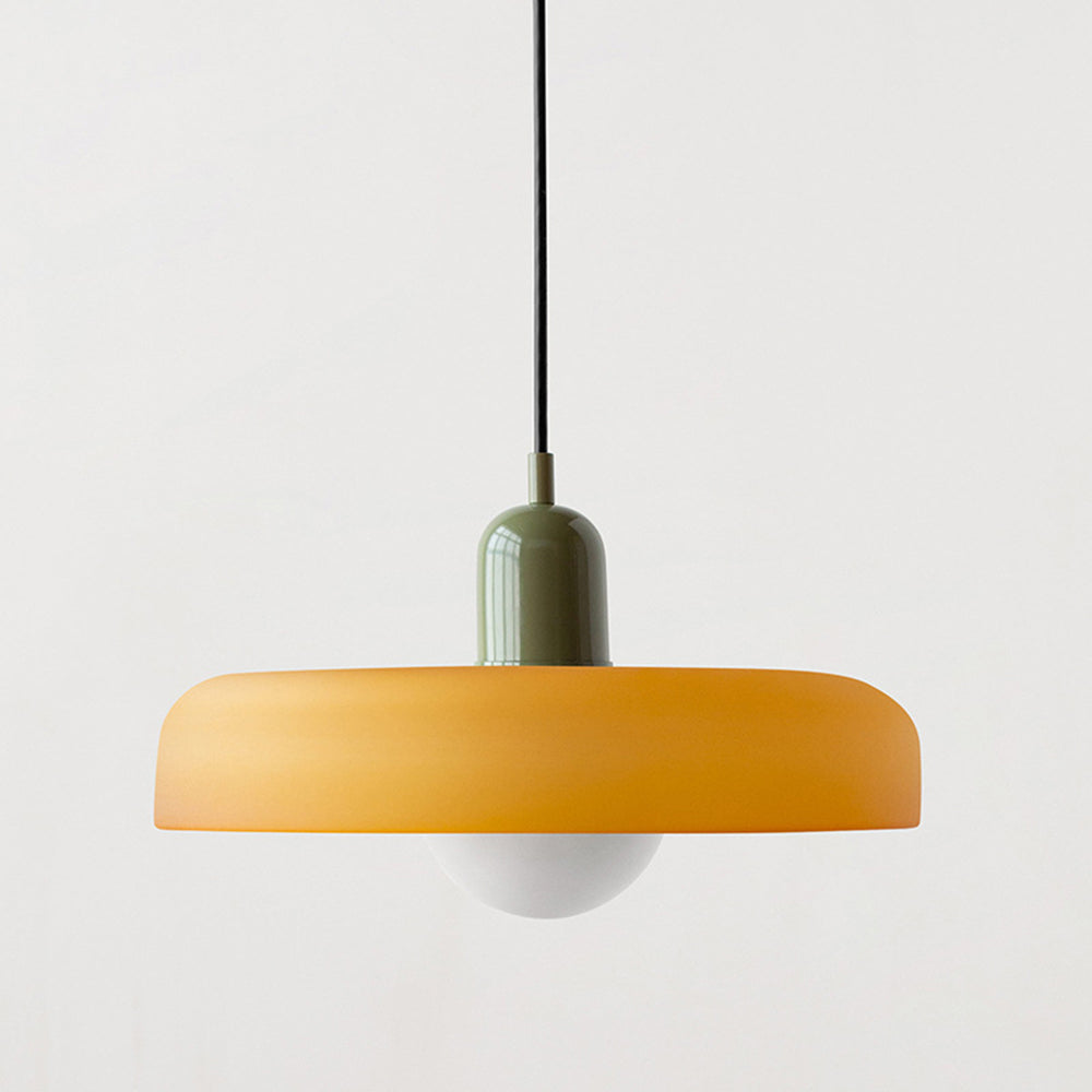 Larger amber-yellow glass shade with an olive-green cap and black cord, shown close up 26