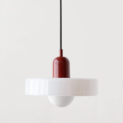 Close view of a glossy white glass pendant with a burgundy cap and round white bulb 38