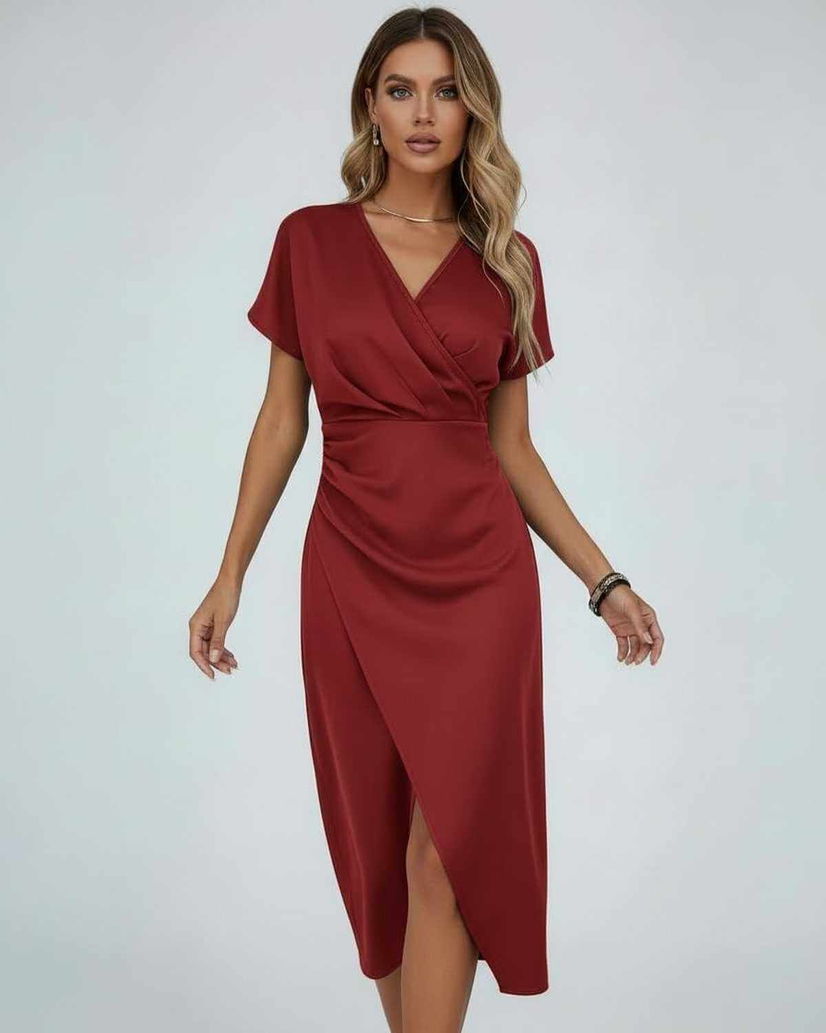 Model wearing the brick red version with arms relaxed at her sides, front view 4