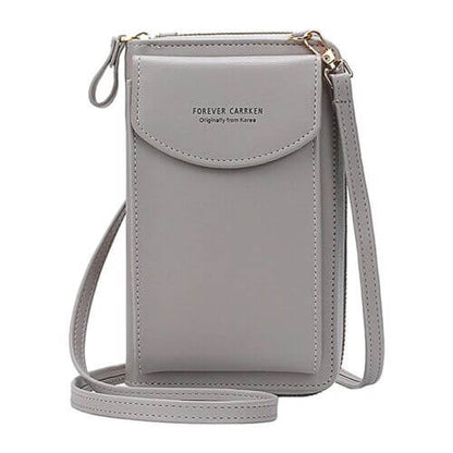 Compact PU leather shoulder bag with an adjustable strap.