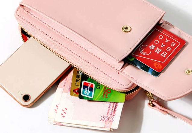 Compact PU leather shoulder bag with an adjustable strap.