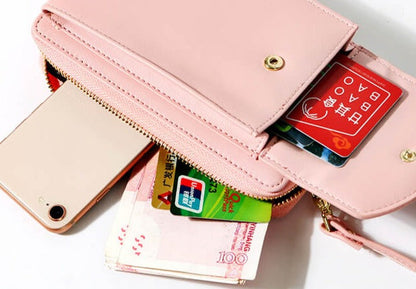 Compact PU leather shoulder bag with an adjustable strap.