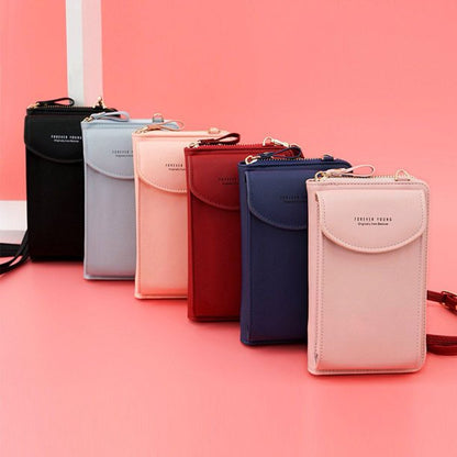 Compact PU leather shoulder bag with an adjustable strap.