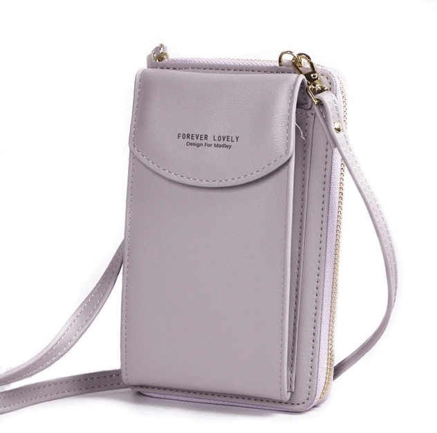 Compact PU leather shoulder bag with an adjustable strap.