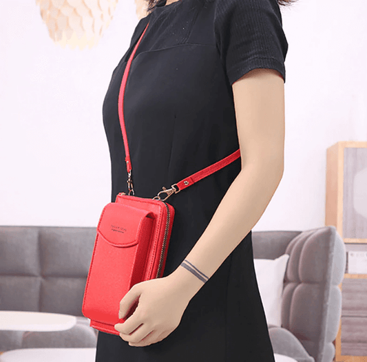 Compact PU leather shoulder bag with an adjustable strap.