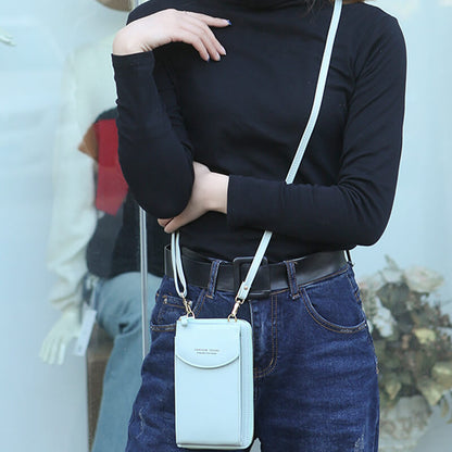 Compact PU leather shoulder bag with an adjustable strap.