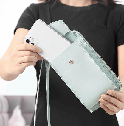 Compact PU leather shoulder bag with an adjustable strap.