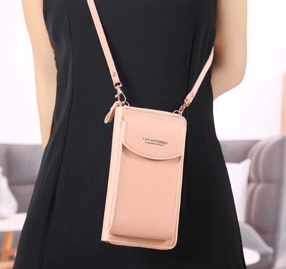Compact PU leather shoulder bag with an adjustable strap.