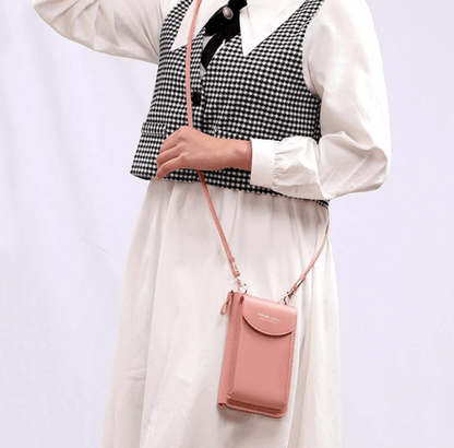 Compact PU leather shoulder bag with an adjustable strap.