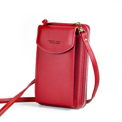 Compact PU leather shoulder bag with an adjustable strap.
