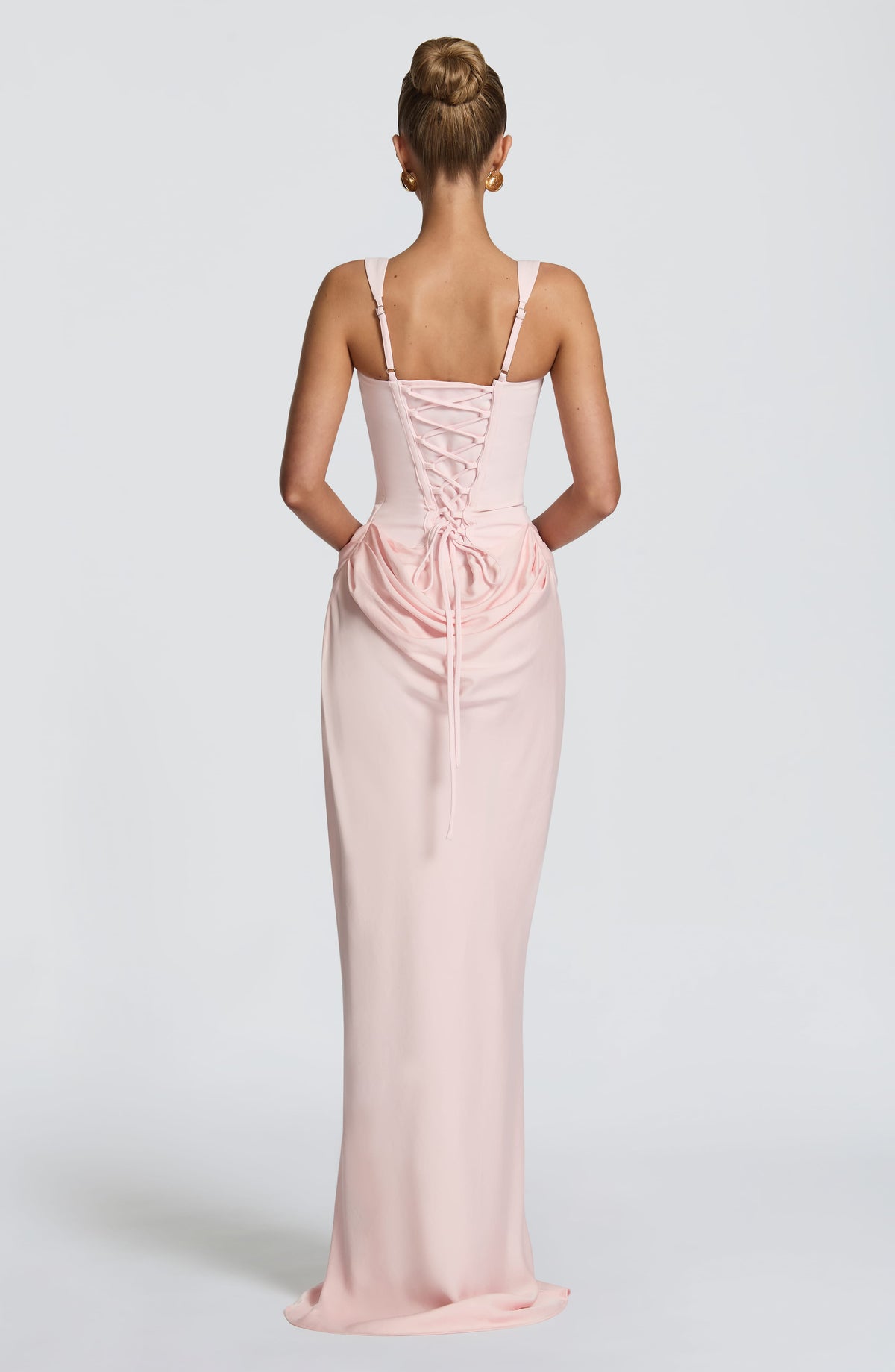 Back view of the pale pink dress with criss-cross lacing, adjustable straps and long ties 15