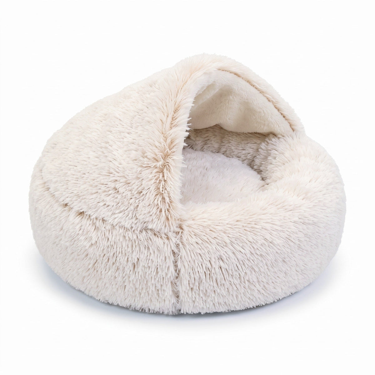 Cream shaggy hooded bed on a white background, with the hood lifted to show a soft white cushion inside. 14