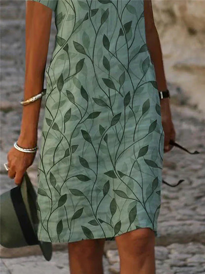 Enchanting Dress with Magical Design in Emerald Green - GreenAura