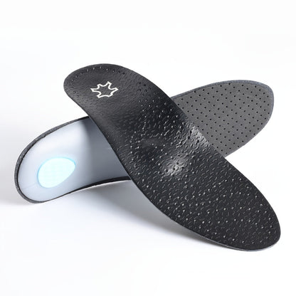 Pair of black perforated insoles crossed over each other, one showing its textured top and the other its pale underside and blue heel pad. 6