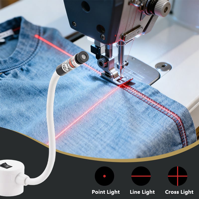 White flexible laser guide on a magnetic base projecting red guide lines across denim beside the needle 1