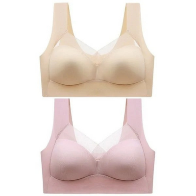 Two seamless bras laid out together on a white background, one in beige and one in pink, both with sheer mesh neckline panels. 7