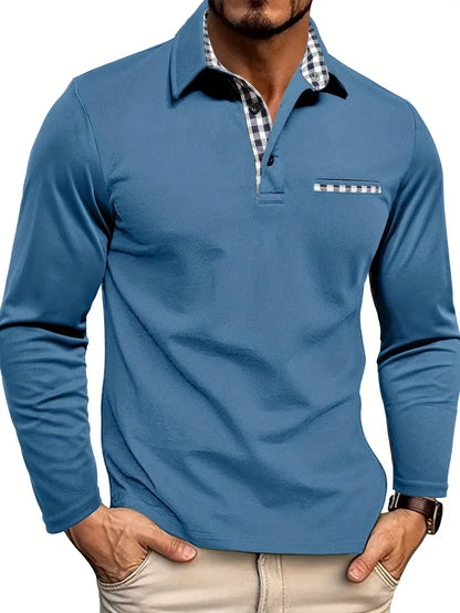 Man wearing the long sleeve polo in muted denim blue, with plaid collar lining and chest pocket edge 4