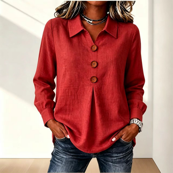 Red version of the shirt with three wooden buttons and gathered cuffs, worn with jeans 10