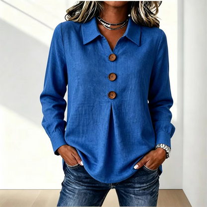 Bright blue version of the shirt with collar and three wooden buttons, worn with jeans 15