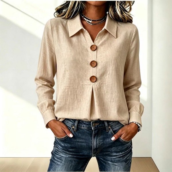 Beige version of the shirt with collar and three wooden buttons, worn untucked over jeans 2