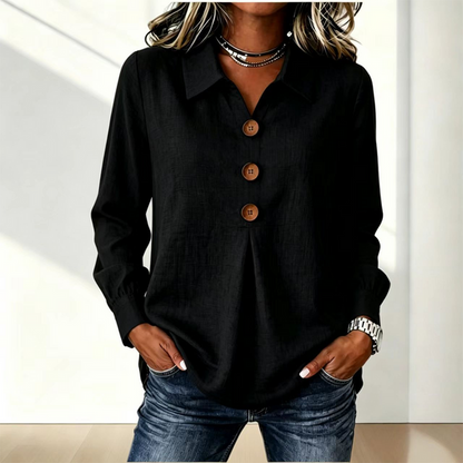 Black version of the shirt with three wooden buttons and gathered cuffs, worn with jeans 4