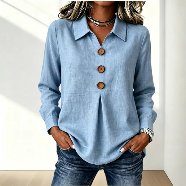 Light blue version of the shirt with three wooden buttons, worn over dark jeans 6