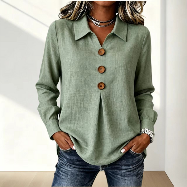 Sage green version of the shirt with collar and three wooden buttons, worn with jeans 7