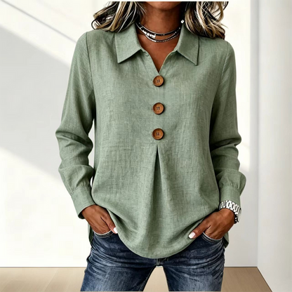 Sage green version of the shirt with collar and three wooden buttons, worn with jeans 7