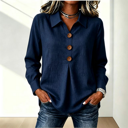 Navy version of the shirt with collar and three wooden buttons, worn with jeans 9