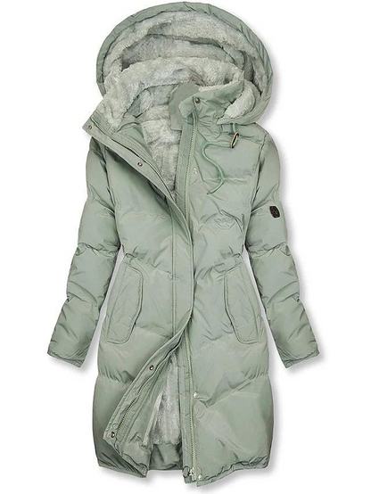 Pale sage green version of the quilted hooded coat, zip partly undone to reveal grey-green fleece lining and the drawstring collar. 2