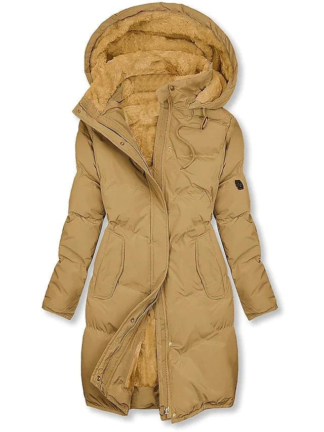 Camel quilted long coat with the zip partly open, showing the soft fleece lining in the hood and body. 1