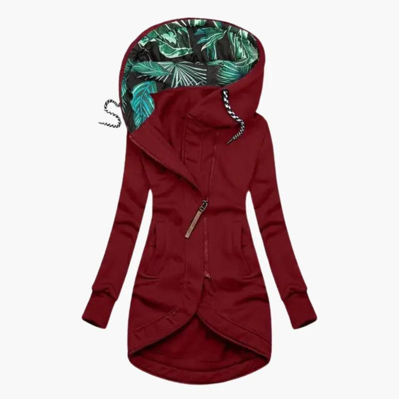 Burgundy red version of the long hooded jacket with diagonal zip, black-and-white drawstrings and green leaf-print hood lining. 4