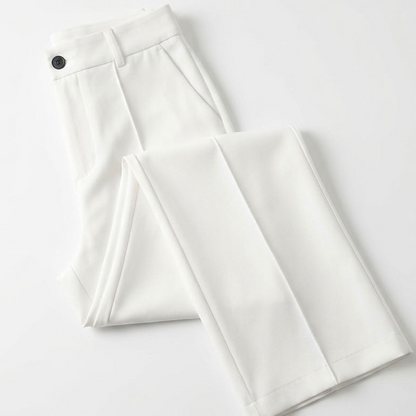 White trousers folded flat, showing the dark button, belt loops, side pocket and front crease 7
