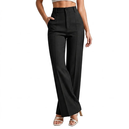 Black high-waisted trousers with front pintuck creases, worn by a model with one hand in the pocket 1