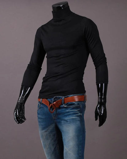 Black high neck top on a headless mannequin, worn with blue jeans and a tan belt 10