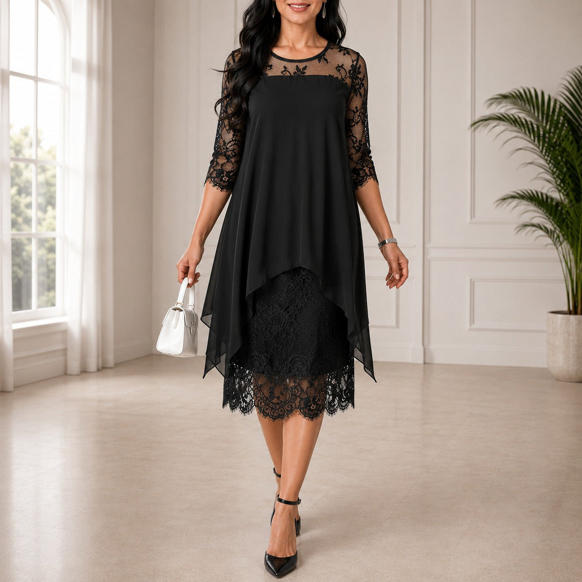 Model wearing the black version with sheer chiffon overlay above a lace underskirt and scalloped lace hem 2